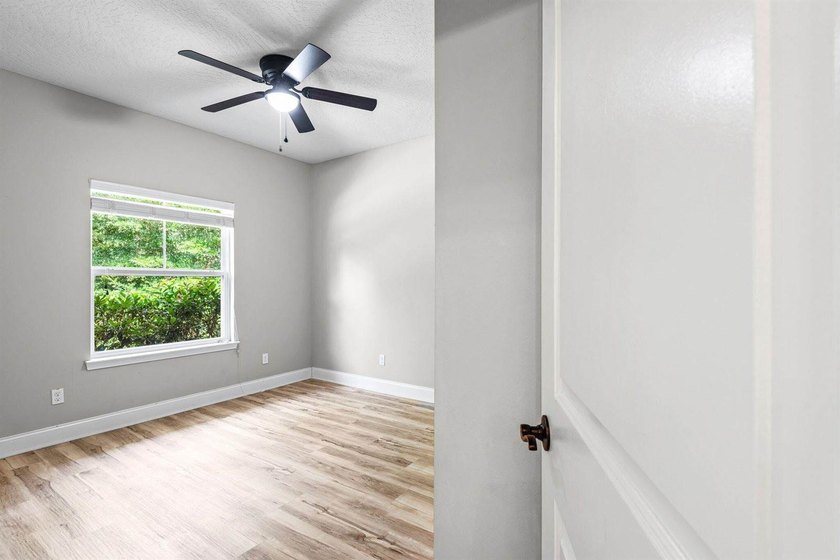 This home has a 3% assumable VA mortgage but that's not even the - photo 33