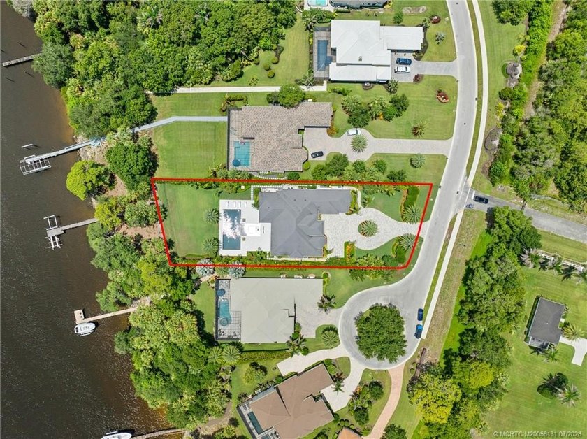 Welcome to this extraordinary waterfront estate in the gated - photo 11