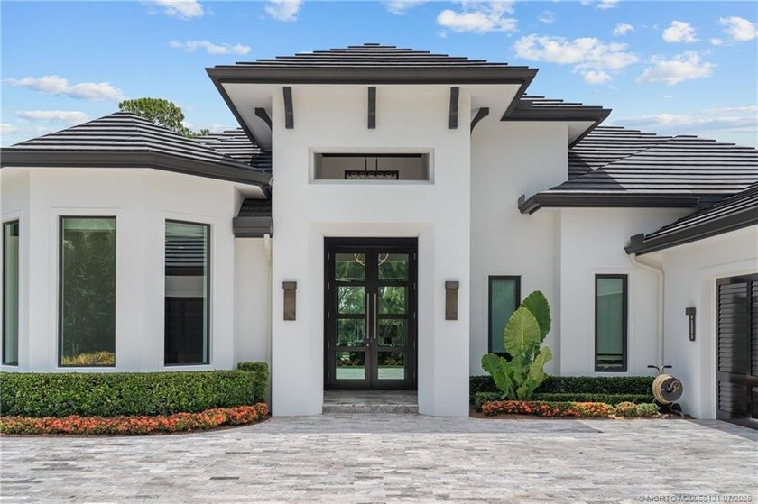 Welcome to this extraordinary waterfront estate in the gated - photo 13