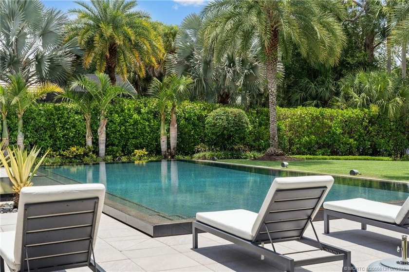 Welcome to this extraordinary waterfront estate in the gated - photo 16