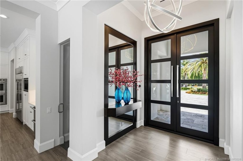 Welcome to this extraordinary waterfront estate in the gated - photo 20