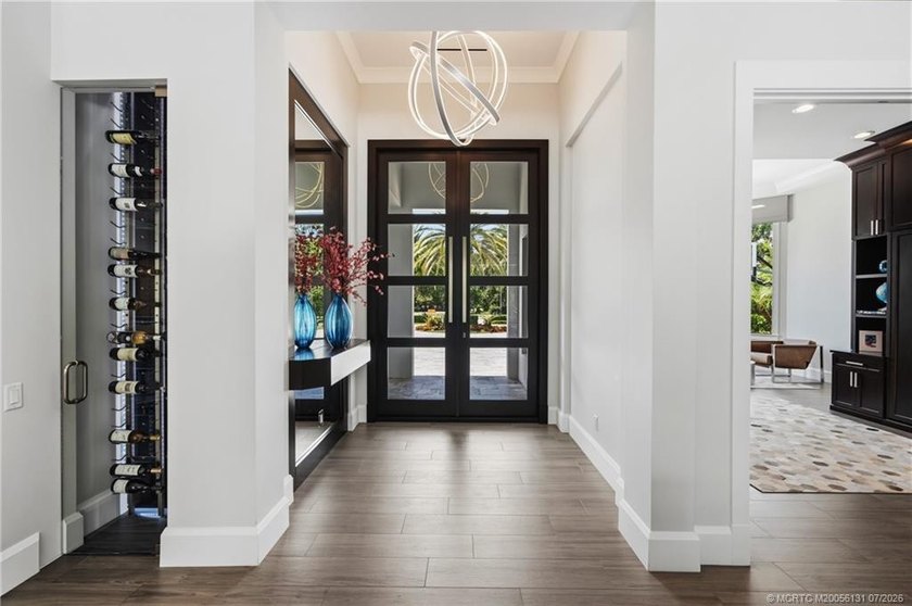 Welcome to this extraordinary waterfront estate in the gated - photo 21