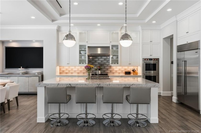 Welcome to this extraordinary waterfront estate in the gated - photo 25