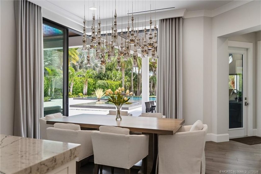 Welcome to this extraordinary waterfront estate in the gated - photo 31