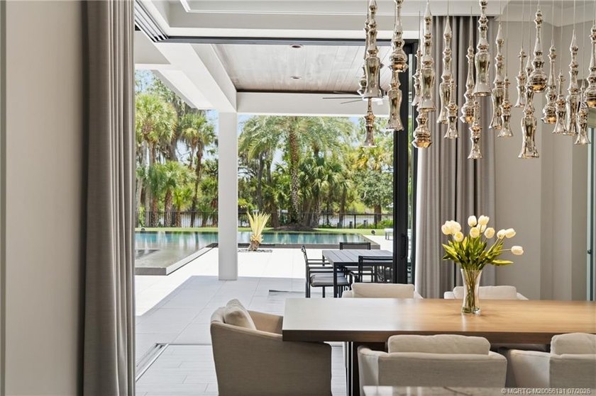 Welcome to this extraordinary waterfront estate in the gated - photo 32