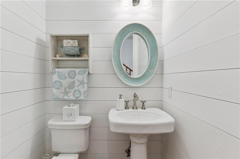 Welcome to an extraordinary custom beach cottage in the coveted - photo 7