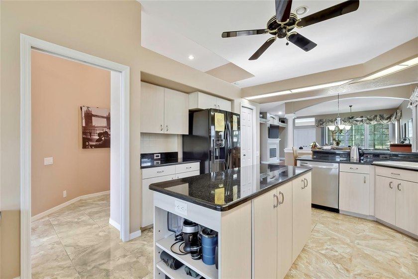 Set within the gated Glen Lakes Golf &amp; Country Club, this 2,238 - photo 15