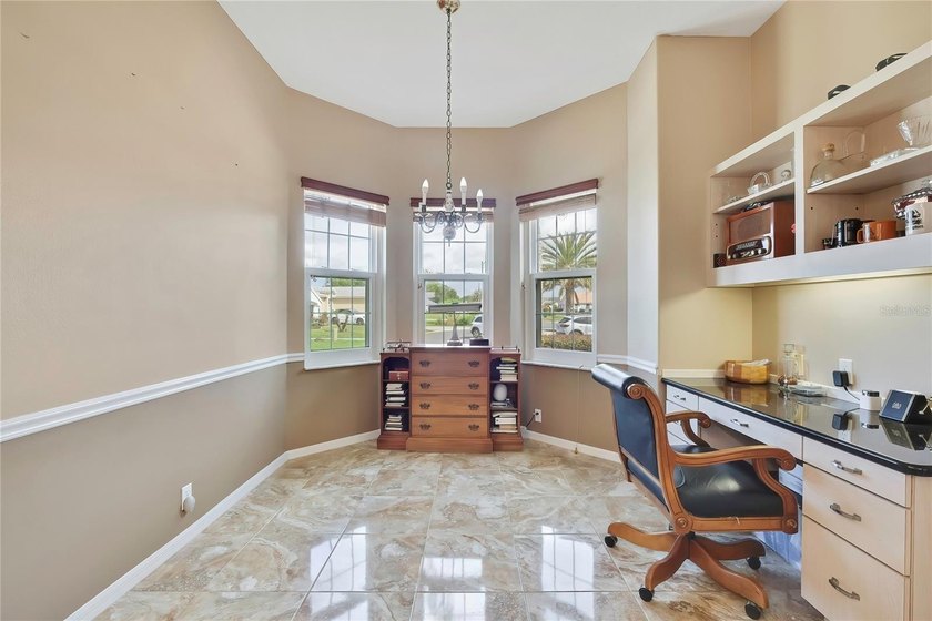 Set within the gated Glen Lakes Golf &amp; Country Club, this 2,238 - photo 16