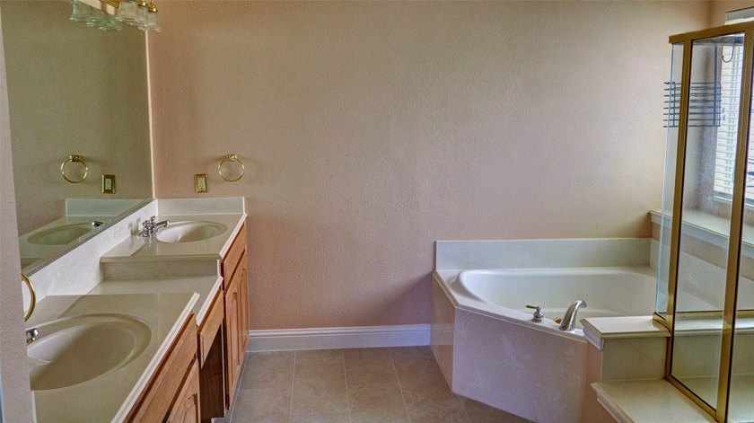 Welcome to this spacious 6-bedroom, 3.5-bath home in one of The - photo 20