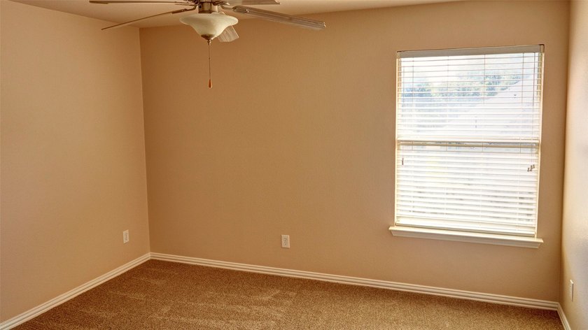 Welcome to this spacious 6-bedroom, 3.5-bath home in one of The - photo 21