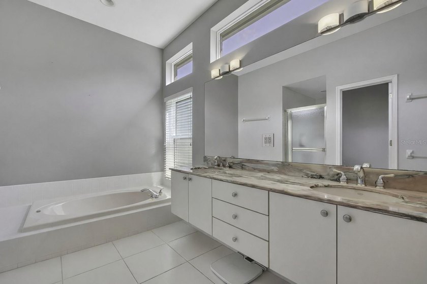 Set within the gated Glen Lakes Golf &amp; Country Club, this 2,238 - photo 23