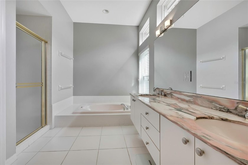Set within the gated Glen Lakes Golf &amp; Country Club, this 2,238 - photo 24