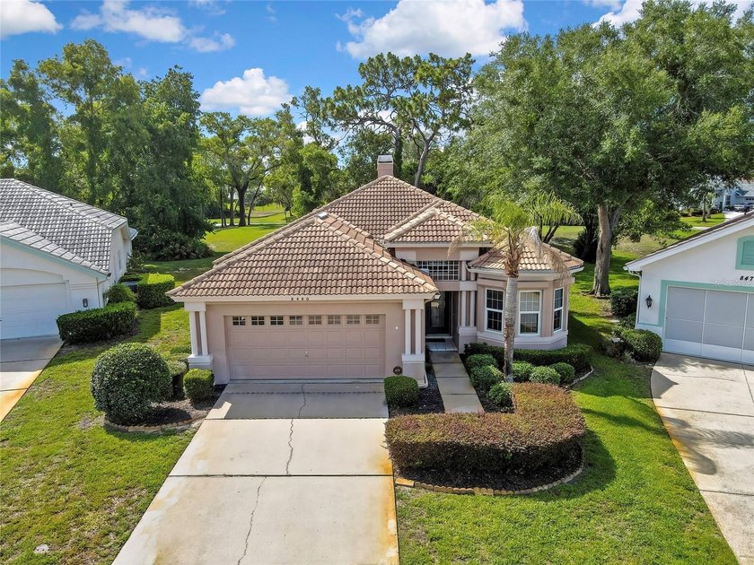 Set within the gated Glen Lakes Golf &amp; Country Club, this 2,238 - photo 46