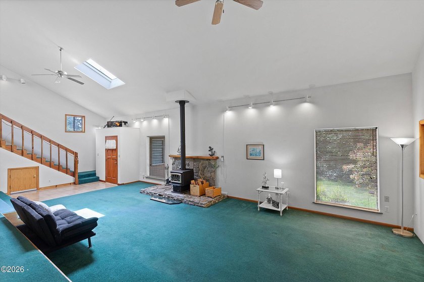 CHARMING COASTAL HOME! This 2,320 square foot home is located on - photo 9