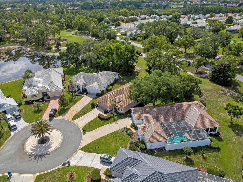 Set within the gated Glen Lakes Golf &amp; Country Club, this 2,238 - photo 49