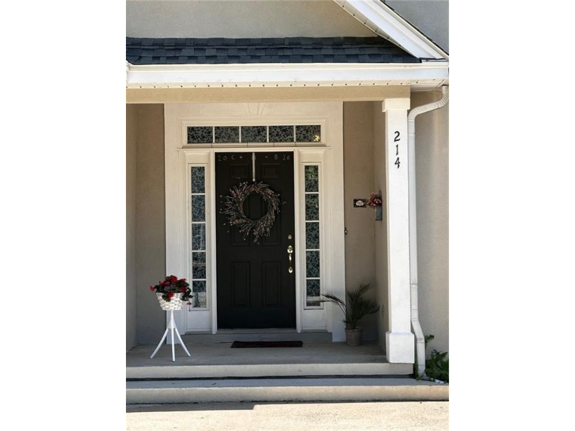 Standing in the entry foyer of this beautiful home, one is - photo 4