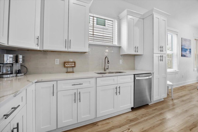 Discover this beautiful 3-story beach home perfectly positioned - photo 12