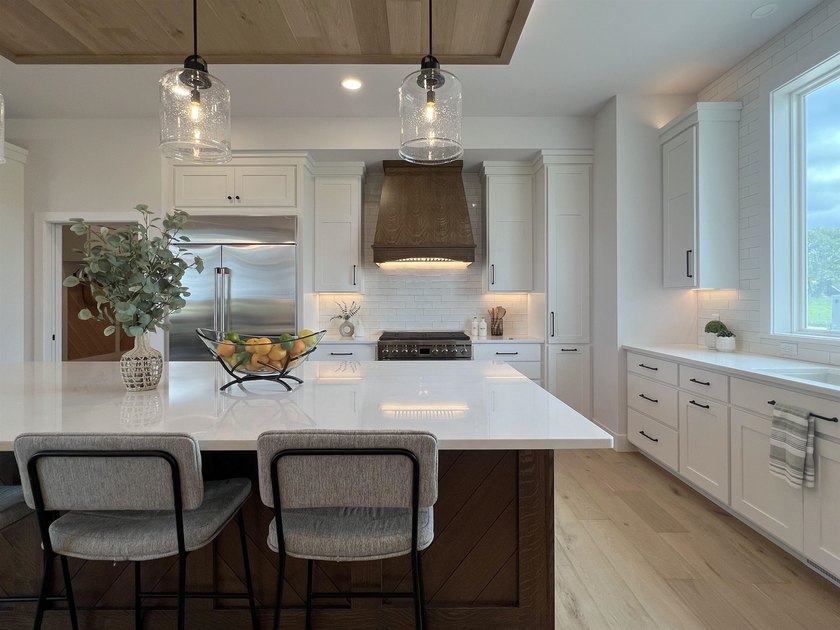 Step into this sunlight-filled home with Amish made built-ins - photo 11
