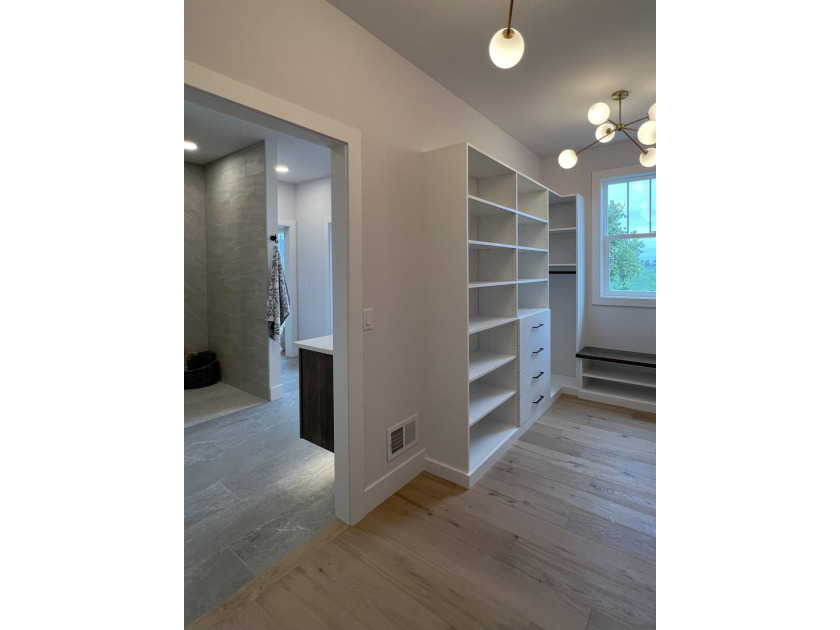 Step into this sunlight-filled home with Amish made built-ins - photo 24