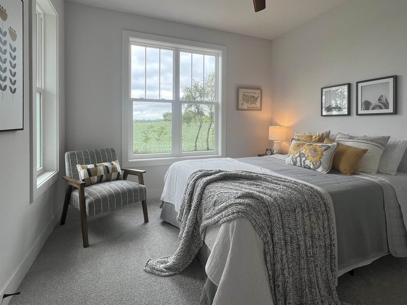 Step into this sunlight-filled home with Amish made built-ins - photo 33