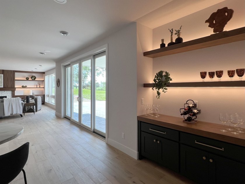 Step into this sunlight-filled home with Amish made built-ins - photo 42