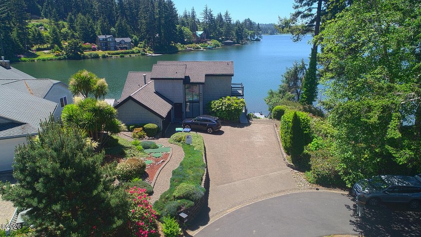 Location, location , location. Leisure Bay lakefront home on - photo 2