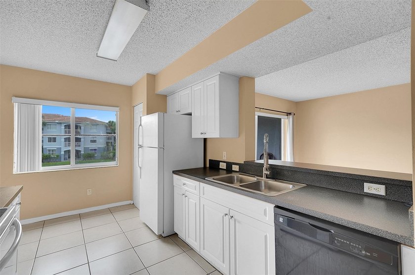 Located in the highly desirable gated community of La Via, this - photo 13