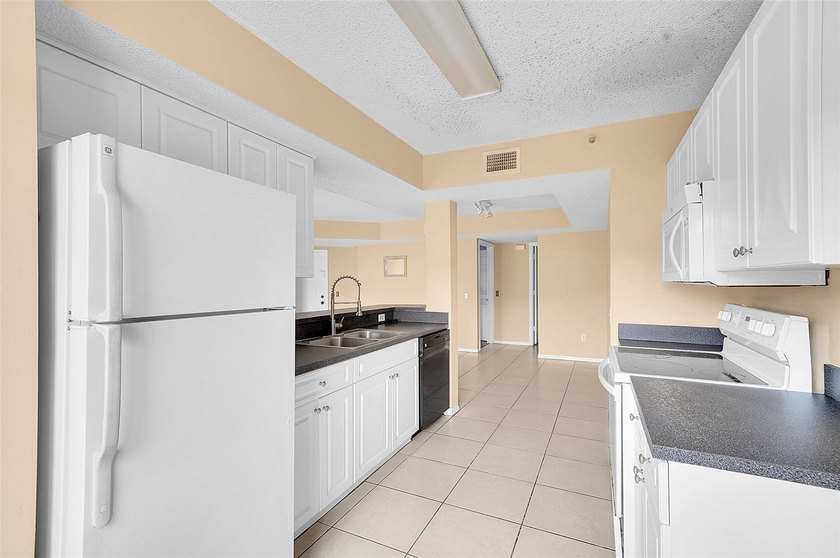 Located in the highly desirable gated community of La Via, this - photo 15