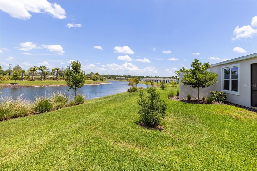 Set on a landscaped cul-de-sac lot with water views, this nearly - photo 22