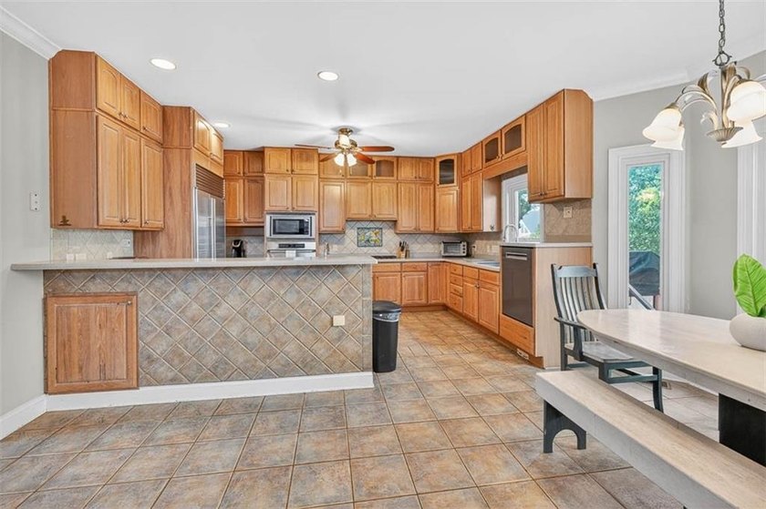 Classic coastal charm meets an unbeatable location in this - photo 5