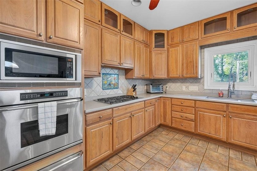 Classic coastal charm meets an unbeatable location in this - photo 6