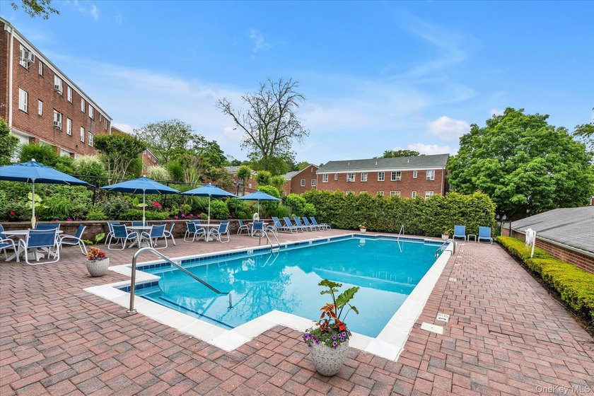 Unparalleled, custom-designed one-bedroom, second floor unit in - photo 12