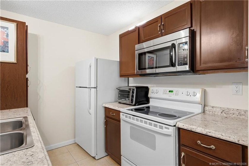 This ground-floor unit in the gated community of The Anchorage - photo 14