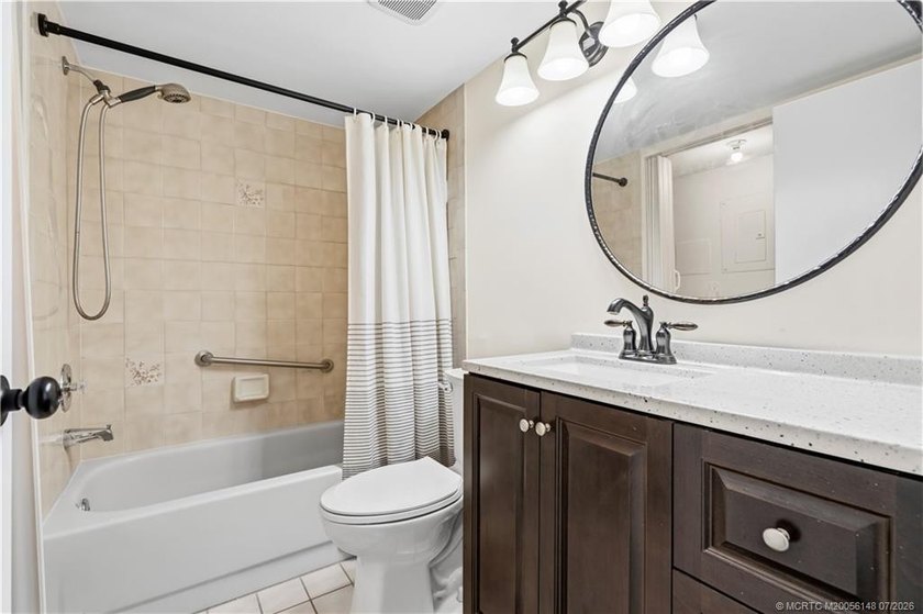 This ground-floor unit in the gated community of The Anchorage - photo 18