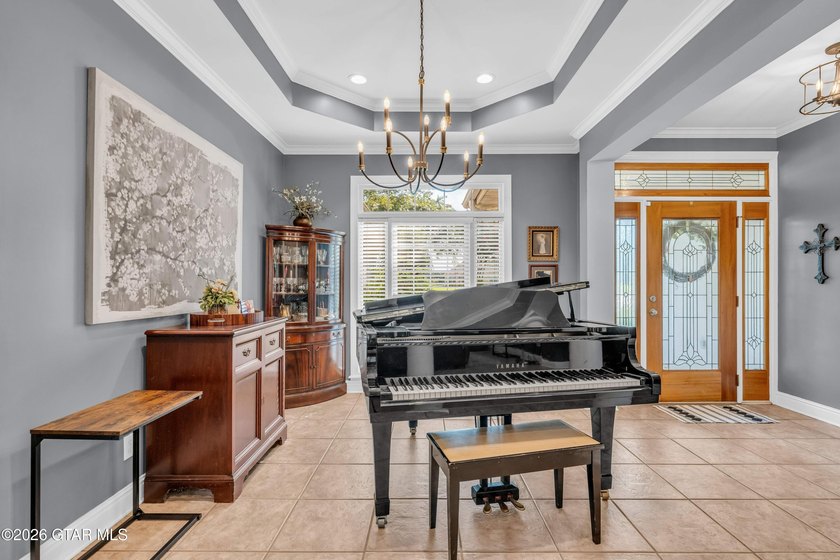 Nestled on approximately 1.5 beautifully landscaped acres in the - photo 5