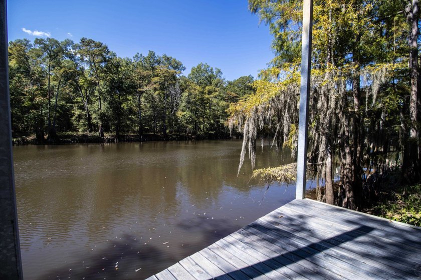WATERFRONT lot on Caddo (Big Cypress Bayou) in a highly - photo 2
