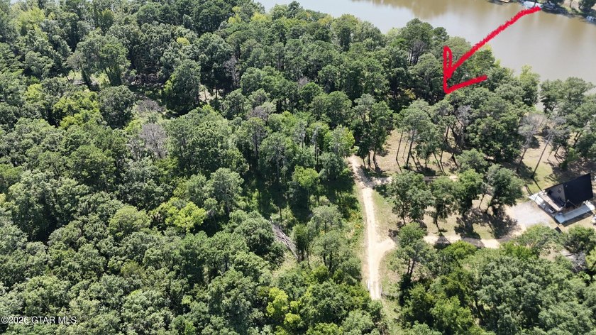Lot 2 A beautiful wooded homesite with river frontage, offering - photo 2
