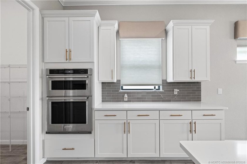 Welcome to this 2022 custom CBS home in Veranda Gardens. Prime - photo 14