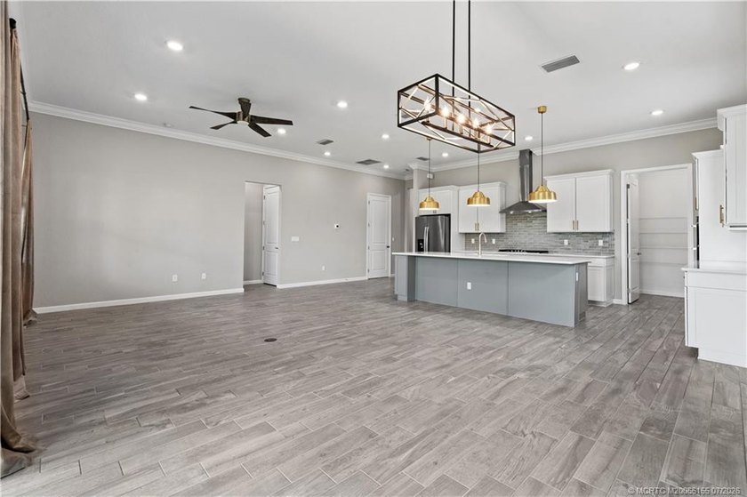 Welcome to this 2022 custom CBS home in Veranda Gardens. Prime - photo 16