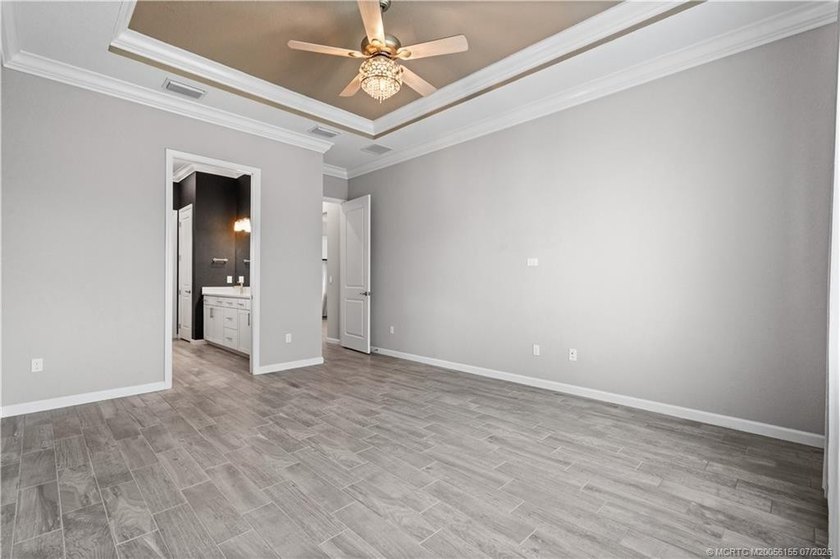 Welcome to this 2022 custom CBS home in Veranda Gardens. Prime - photo 21