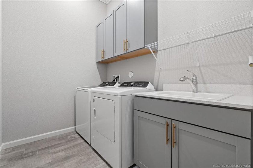 Welcome to this 2022 custom CBS home in Veranda Gardens. Prime - photo 28