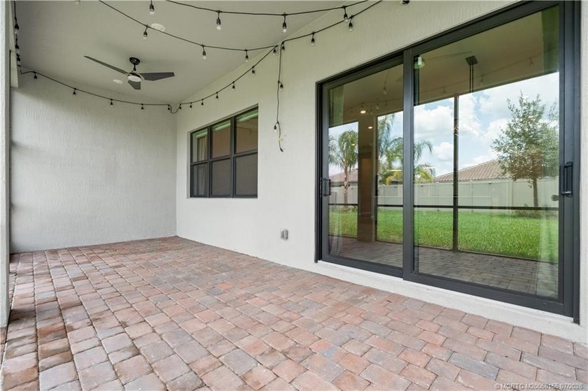 Welcome to this 2022 custom CBS home in Veranda Gardens. Prime - photo 32