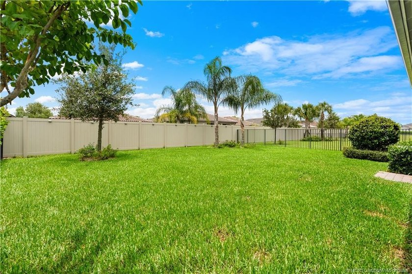 Welcome to this 2022 custom CBS home in Veranda Gardens. Prime - photo 37