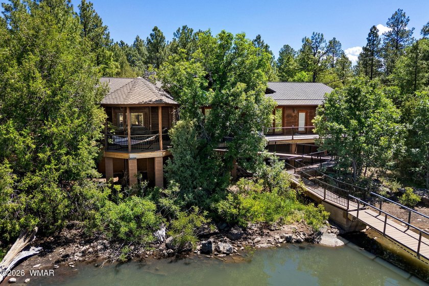 Wake up to breathtaking furnished waterfront views from this - photo 3