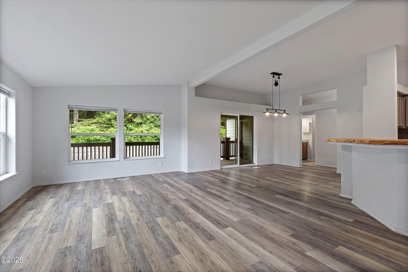 Welcome to this spacious and versatile 2,500 sqft home tucked - photo 2