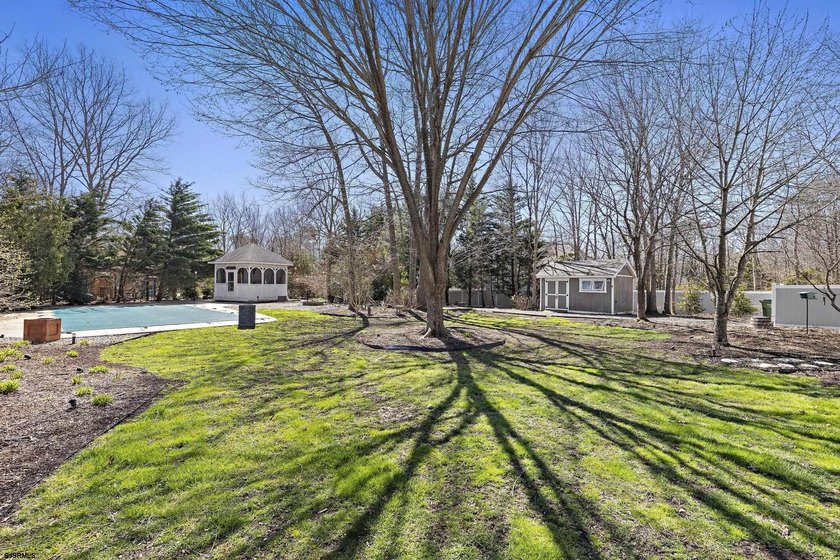 Welcome to this custom-built Colonial nestled in a hidden gem of - photo 50