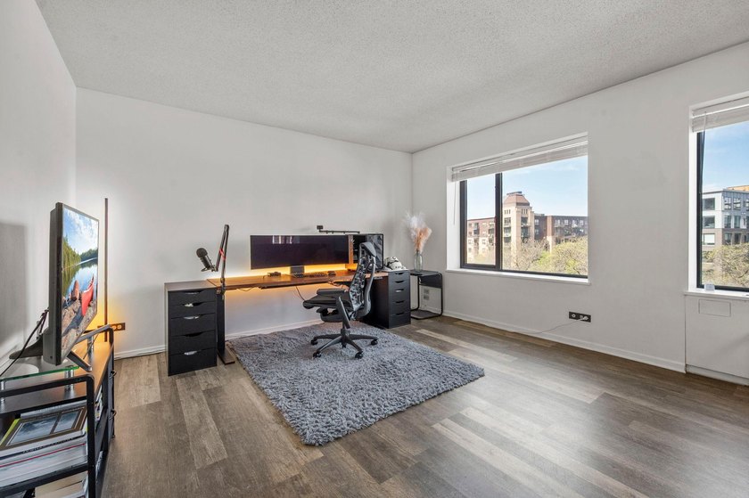 Move-in ready and beautifully updated, this River Towers condo - photo 27