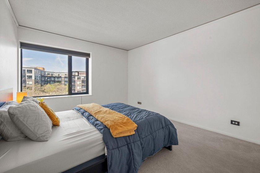 Move-in ready and beautifully updated, this River Towers condo - photo 39