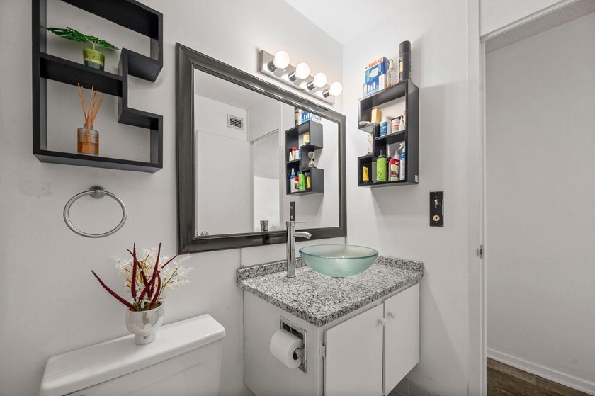 Move-in ready and beautifully updated, this River Towers condo - photo 44