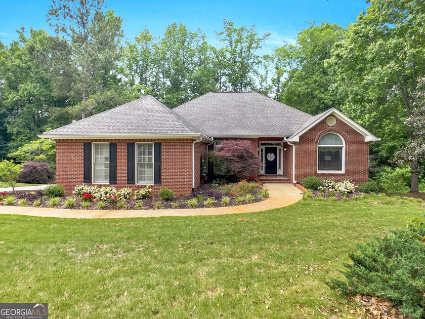 Welcome to this beautifully maintained home located in the - photo 2